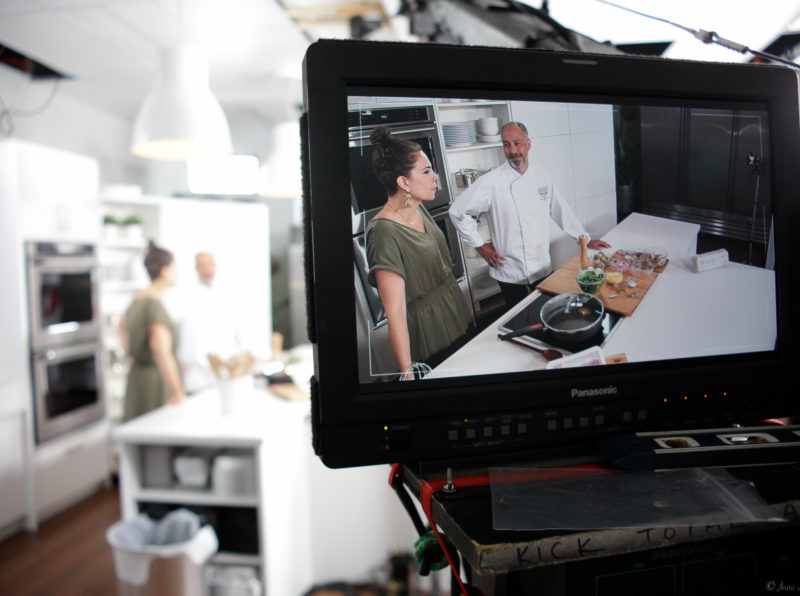 Host Dez Daniels and Granny’s Chef Jason Wortzman are being recorded while cooking