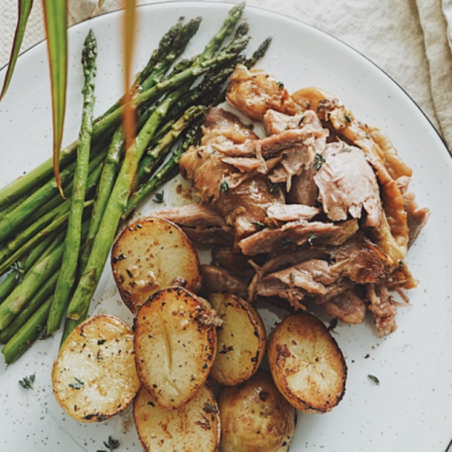 Slow Oven-Baked Turkey Drumsticks with Potatoes and Asparagus