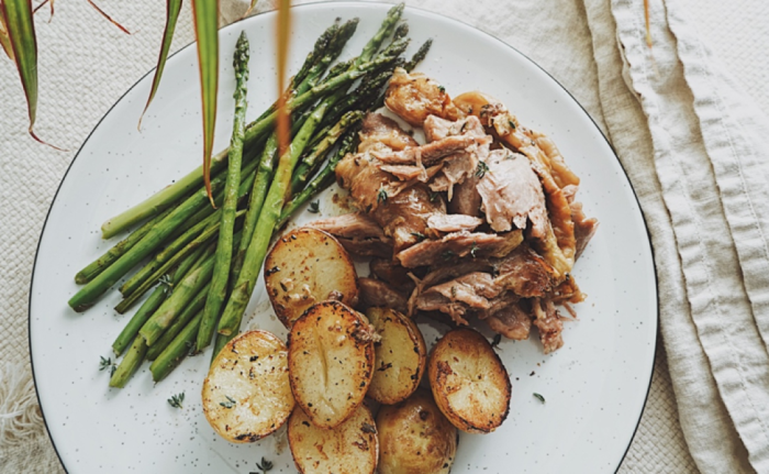Slow Oven-Baked Turkey Drumsticks with Potatoes and Asparagus