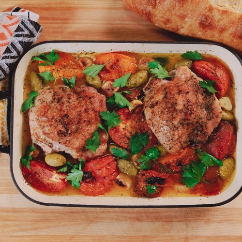 Stewed turkey thighs with tomatoes, olives, and garlic