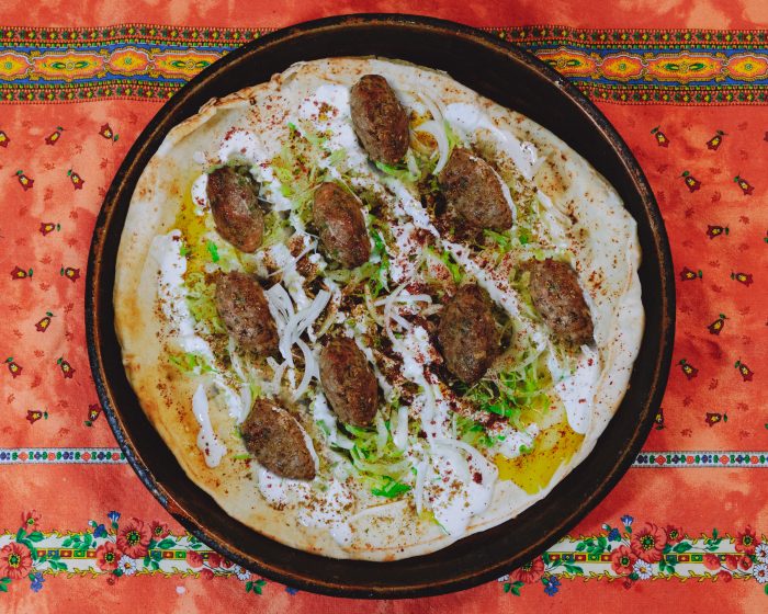 Turkey meatballs served in pita topped with yogurt sauce and shredded romaine