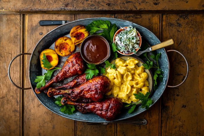 Smokey & Saucy Turkey Drumsticks with Grilled Peach BBQ Sauce