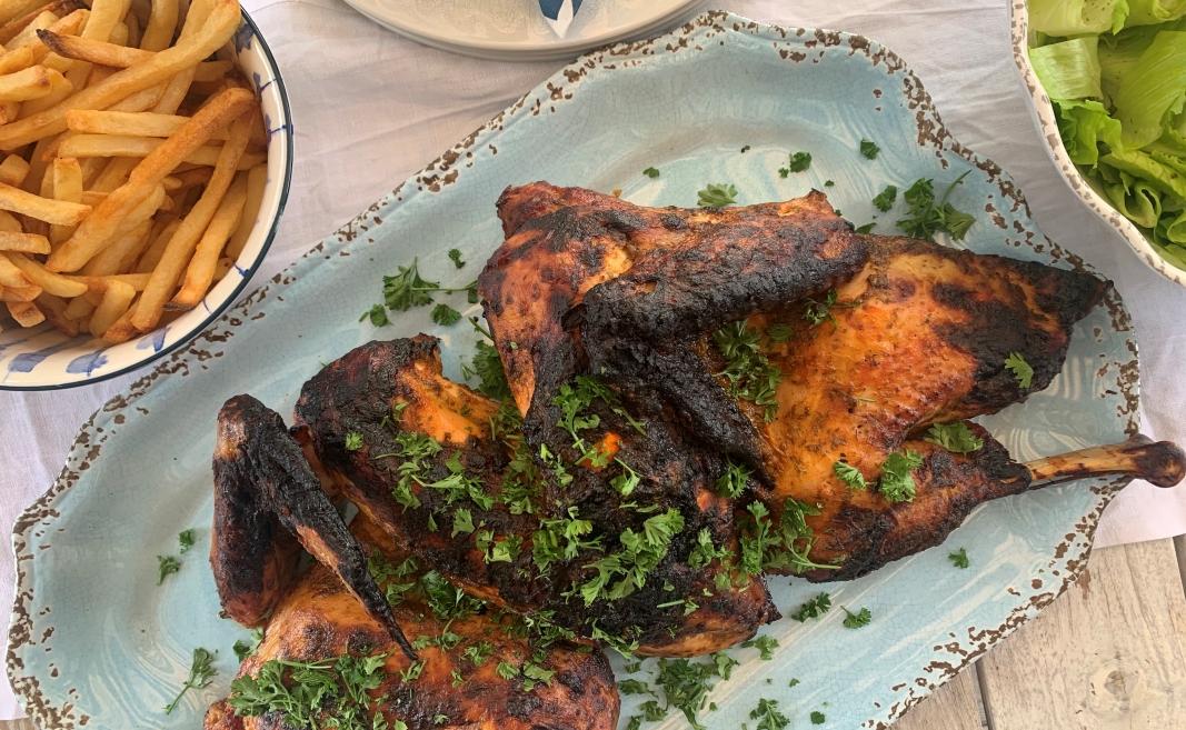 Barbecued Spatchcock Turkey Portuguese Style on a platter