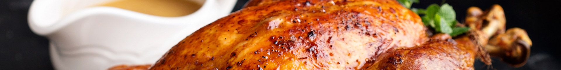 roasted turkey with gravy bowl