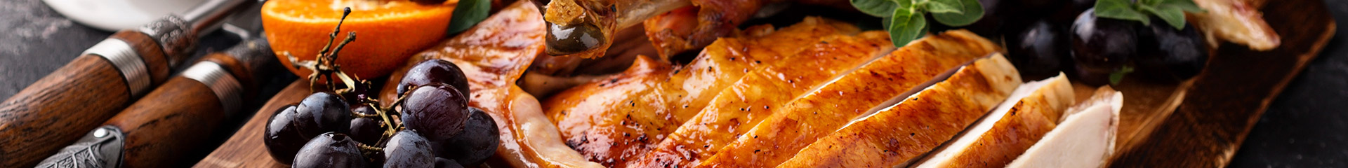 sliced turkey on a cutting board