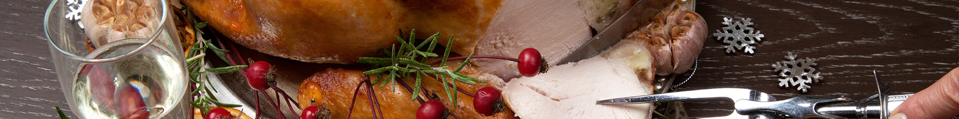serving a slice of turkey paired with wine